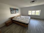 Reetgedecktes Bauernhaus mit Boddenblick - Schlafzimmer