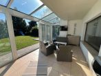 Freistehendes Einfamilienhaus mit großem Garten, Wintergarten und Doppelgarage - Wintergarten