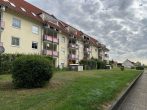 Bezugsfrei!! Schöne 3-Raumwohnung mit Balkon + TG in Ermlitz - Hausansicht