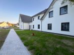 Neuwertig! Ferienappartement direkt am Strand! - Hausansicht