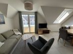Ferienhaus mit 8 WE direkt am Meer - Wohnzimmer