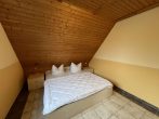 Ferienhaus mit vier Wohneinheiten in Buschvitz und Wasserblick - Schlafzimmer