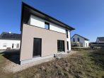 Sie wollen nur noch einziehen? Stadtvilla zum Erstbezug! - Hausansicht