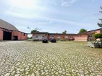 Einzigartiger Hof mit zwei Wohnhäusern, einer Scheune und Garten - Hausansicht 3