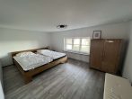 Reetgedecktes Bauernhaus mit Boddenblick - Schlafzimmer