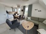 Ferienhaus mit 8 WE direkt am Meer - Wohn-/ Essbereich