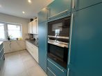 Neuwertiger Bungalow mit großer Doppelgarage + EBK - Küche