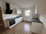 Attraktive Zweiraumwohnung mit PKW- Stellplatz+ EBK - Küche